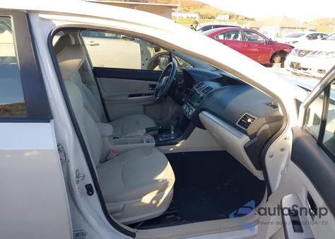 2015 Subaru Impreza 2.0I Premium z USA, uszkodzony, nr VIN JF1GJAK61FH014671